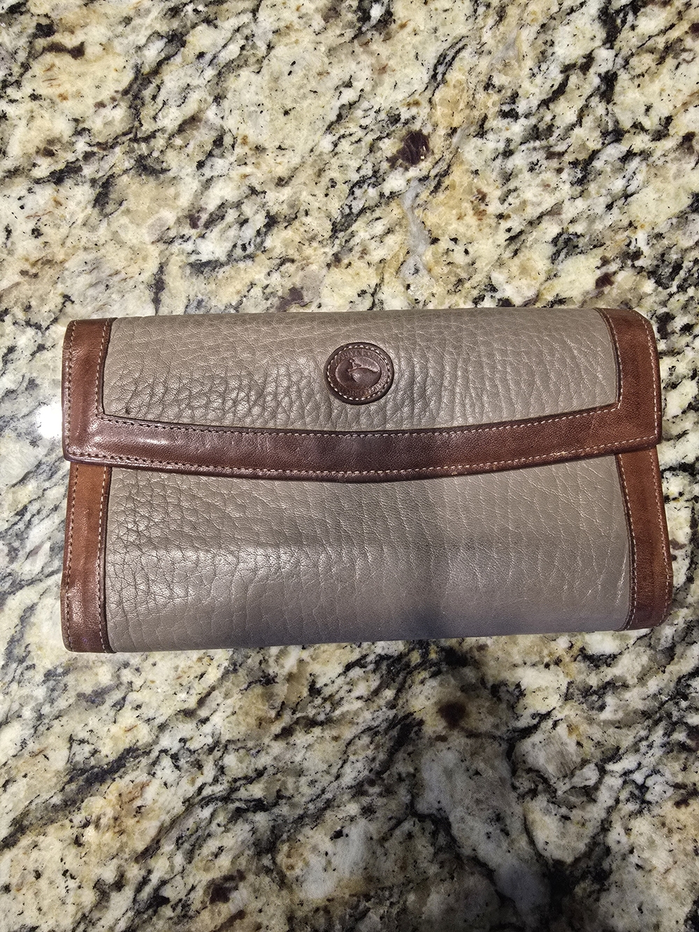 Dooney & Bourke Taupe Leather Clutch with Brown Trim